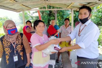 PNM BAGIKAN BANTUAN COVID-19 DI PADANG