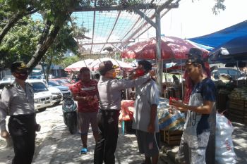 Warga sambut baik pembagian masker Satgas Aman Nusa Polda Sulut