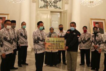 PGRI serahkan bantuan untuk guru melalui ACT