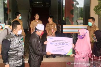 BPJAMSOSTEK serahkan Jaminan Kematian kepada honorer di Dharmasraya
