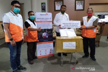 WVI kembali serahkan ratusan paket APD kepada gugus tugas COVID-19 di Touna