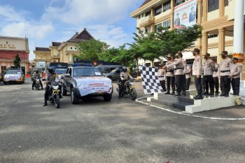 Jambi police dispatch food aid for COVID-affected households