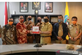 Gambar busana adat Tidung di uang edisi khusus Rp75 ribu bagi masyarakat Kaltara
