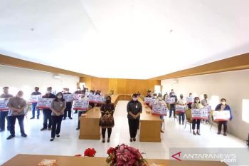 BPJAMSOSTEK bersama Pemprov Sulut serahkan santunan kematian ke 30 ahli waris