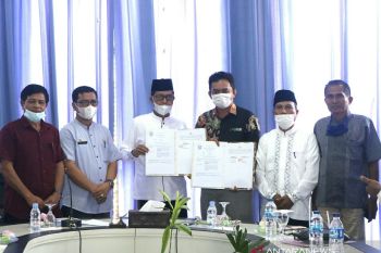 Pemkab Pasaman Barat tekan MoU pemanfaatan gudang komoditi yang lama terbengkalai,