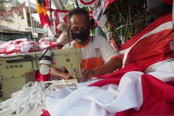 Mendulang rupiah dari sang saka merah putih