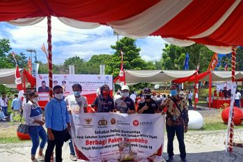 KSP Sahabat Mitra Sejati dan Bank Sampoerna Berbagi Sembako di Manado