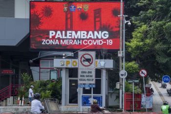 Kota Palembang keluar dari  status zona merah COVID-19