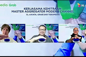 Xl Axiata jalin kerja sama dengan Grab dan Tokopedia