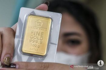 Harga emas anjlok
