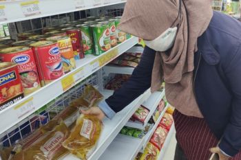 Menilik redupnya kemilau minyak goreng di daerah produsen CPO