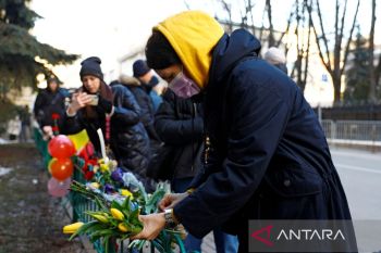 Pengunjuk rasa  Rusia: "Maafkan Kami" Ukraina