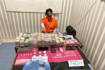 Pasutri di Kampar sembunyikan sabu di kandang anjing
