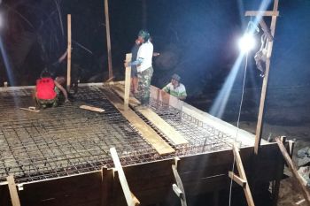 Satgas TMMD Kodim 1303/Bolmong kerja hingga malam hari