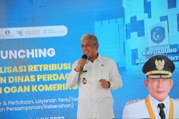 Pedagang pasar tradisional OKI mulai gunakan QRIS