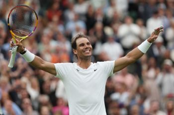 Wimledon 2022 -  Petenis Spanyol Rafael Nadal menuju babak ketiga