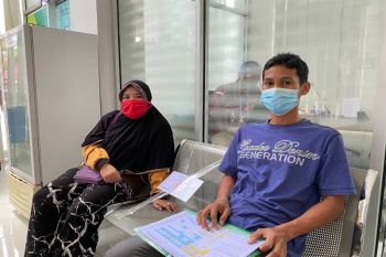 Petani karet ini bertekad menjaga kepesertaan JKN-KIS selalu aktif