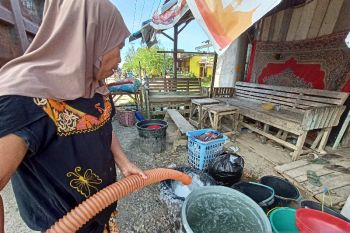 PMI Parigi Moutong  bantu air bersih untuk korban banjir bandang Torue