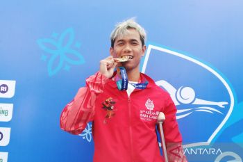 Perenang asal Palembang Jendi kian bersemangat ditonton langsung kedua orang tua