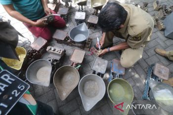 Tera ulang timbangan pedagang