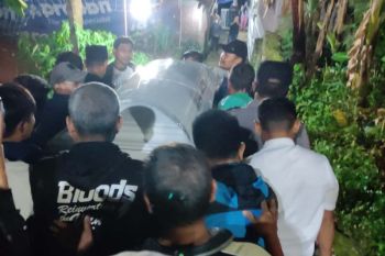 Coffin of Indonesian woman killed in Texas shooting, buried in Semarang