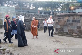 R20 delegates' Kimpulan Temple visit reflects social tolerance