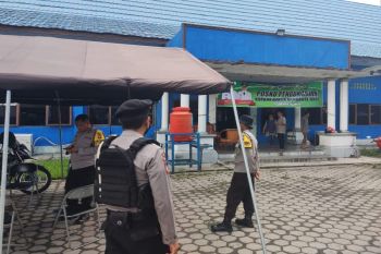 Anggota Polresta Palangka Raya patroli di lokasi banjir cegah aksi pencurian