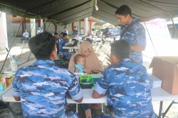 Lanud RSA buka posko pengobatan gratis usai banjir di Natuna