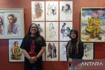 Pasutri Budi Bi-Ami Tri pamerkan lukisan "kasih sayang" di Surabaya