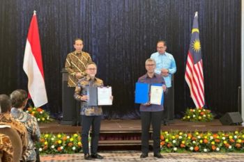 Indonesia dan Malaysia tanda perbarui perjanjian perdagangan perbatasan