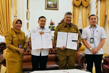 Solok-BPJAMSOSTEK tandatangani MoU percepatan perlindungan jaminan sosial ketenagakerjaan