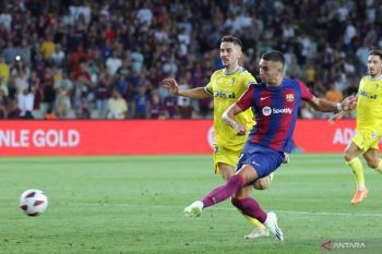 Dua gol penghujung laga amankan kemenangan Barcelona  atas Cadiz