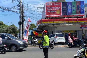 Irwan, sang 'polisi cepek' tunawicara pahlawan jalan macet