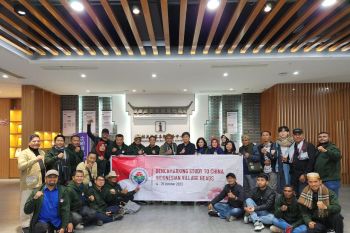 Ministry, village heads study village development in China