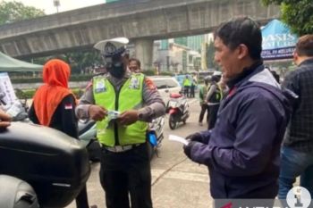 Jakarta expands emission tests to check vehicles' engine exhaust