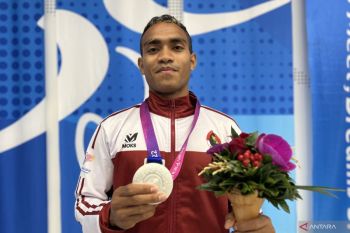 Alfin lawan rasa gugup dan raih perak di debut Asian Para Games