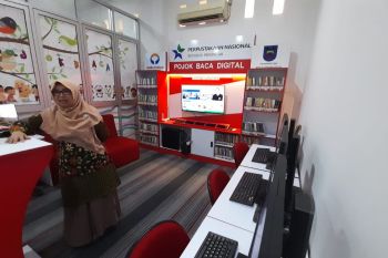 Pemkot Sawahlunto sedang memasang Pocadi dari Perpusnas RI