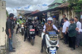 Gunakan sepeda motor, Pj Gubernur Sumsel keliling Palembang tinjau TPS