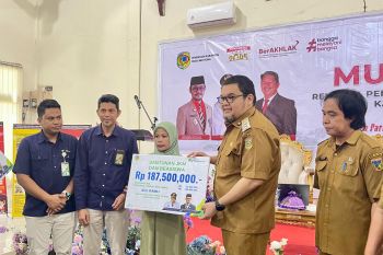 BPJAMSOSTEK dan Pemkab Parigi Moutong serahkan santunan ahli waris Rp297 juta