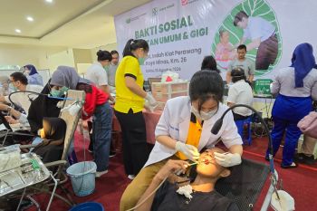 PT IKPP &amp; PT Arara Abadi dan Tzu Chi turunkan 27 dokter saat baksos kesehatan