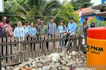 PNM dan BPN beri alat pengolahan sampah kepada warga Bunaken