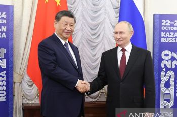 Xi Jinping dan Vladimir Putin bertemu sebelum KTT BRICS