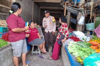 Polsek Pinggir ajak pedagang pasar sukseskan pilkada