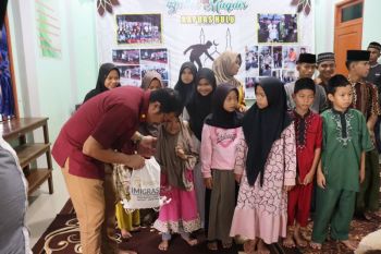 Imigrasi Putussibau bagikan MBG dan santuni anak yatim piatu