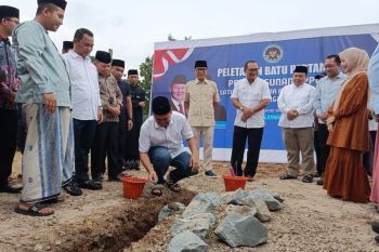 Minister builds kitchen for free meals program at Islamic school