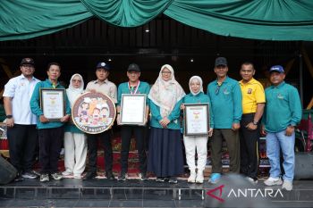 Kabupaten Kampar Raih Rekor Muri Porsi Ikan Patin Terbanyak