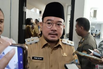 Pemkot  Palembang beri seragam sekolah dan kain kafan gratis