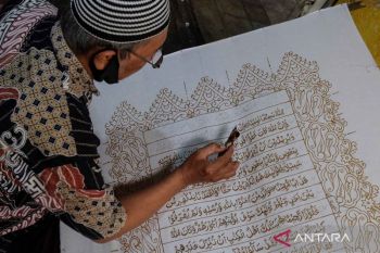 Mempelajari Al Quran dengan batik tulis