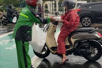 Grab siap evaluasi program berlangganan Akses Hemat untuk mitra
