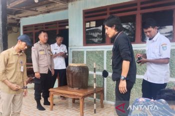 Di kebun ditemukan kerangka dalam guci